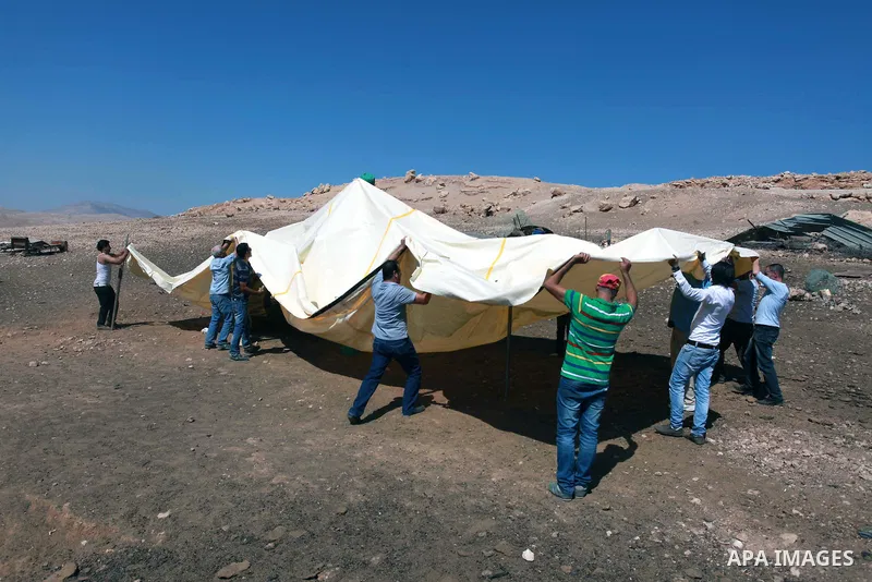 Palestinians set up a tent in the Jordan valley village of Makhoul September 30, 2013. Israel's army on Monday declared the Jordan Valley village of Makhoul a closed military area to prevent Palestinian and international...