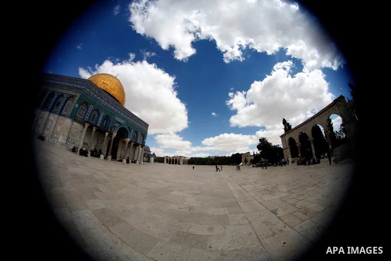 Palestinian worshipers pray outside the Dome of the Rock mosque at the Al-Aqsa compound, Islam s third holiest site, in the old city of Jerusalem, on October 4, 2013. Photo by Saeed Qaq