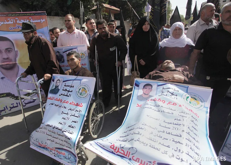 Palestinian supporters of the Islamic Jihad militant group participate in a protest in solidarity with palestinian prisoners held in Israeli jails, in front of the headquarters of the United Nations (UNRWA) in Gaza City,...