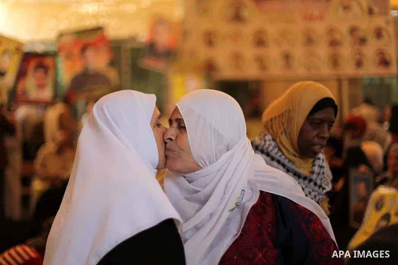 Palestinian women take part in a protest demanding the release of all Palestinian prisoners held in Israeli jails,in front of the Red Cross office in Gaza City October 28, 2013. Israel is to release 26 Palestinian prison...
