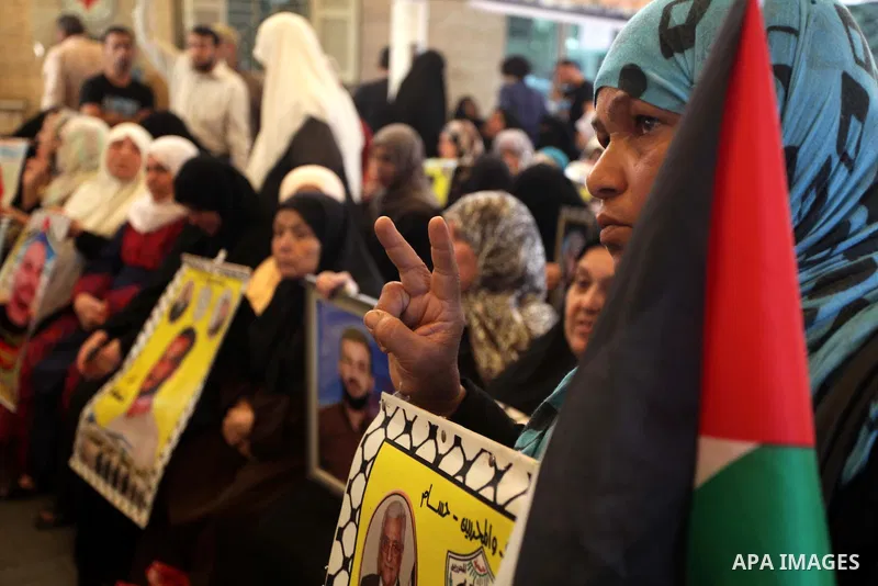Palestinian women take part in a protest demanding the release of all Palestinian prisoners held in Israeli jails,in front of the Red Cross office in Gaza City October 28, 2013. Israel is to release 26 Palestinian prison...