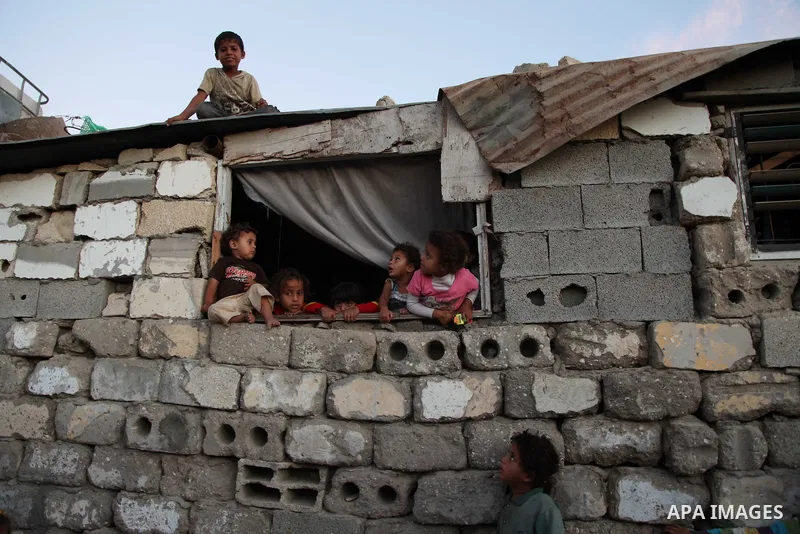 Palestinian Children play outside their home in the poverty-stricken quarter of al-Zaytoon in Gaza City, on Oct. on Oct. 29, 2013. Photo by Emad Nassar