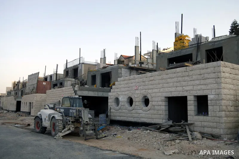 A construction site is seen in Pisgat Zeev, an urban settlement in an area Israel annexed to Jerusalem after the 1967 Middle East war, near the Arab village of Beit Hanina, North Jerusalem, October 29, 2013. The PLO deni...