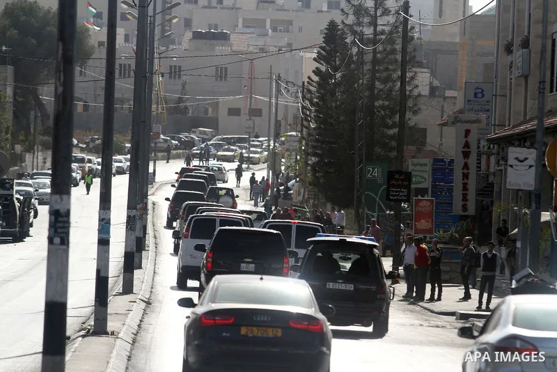 U.S. Secretary of State John Kerry, travels in his vehicle on his way to meet Palestinian President Mahmoud Abbas, in the West Bank city of Bethlehem, 06 November 2013. Kerry began a day of meetings in Jerusalem and Beth...