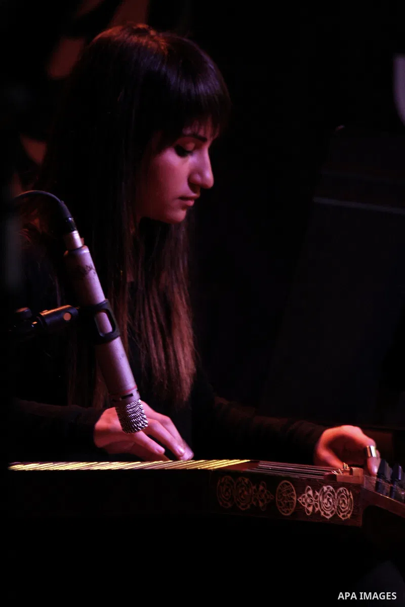 A Palestinian member of "Maqamat-al-Quds" musical band performs during the Opening of "Music nights in Jerusalem of Arab" festival, in Jerusalem on November 07, 2013. The festival organised by Edward Said music conservat...