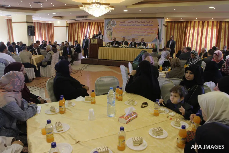 Palestinian Prime Minister in Gaza Strip Ismail Haniyeh, speaks during a meeting with Syrian and Palestinian-Syrian refugees in Gaza City on November 17, 2013. Photo by Mohammed Asad