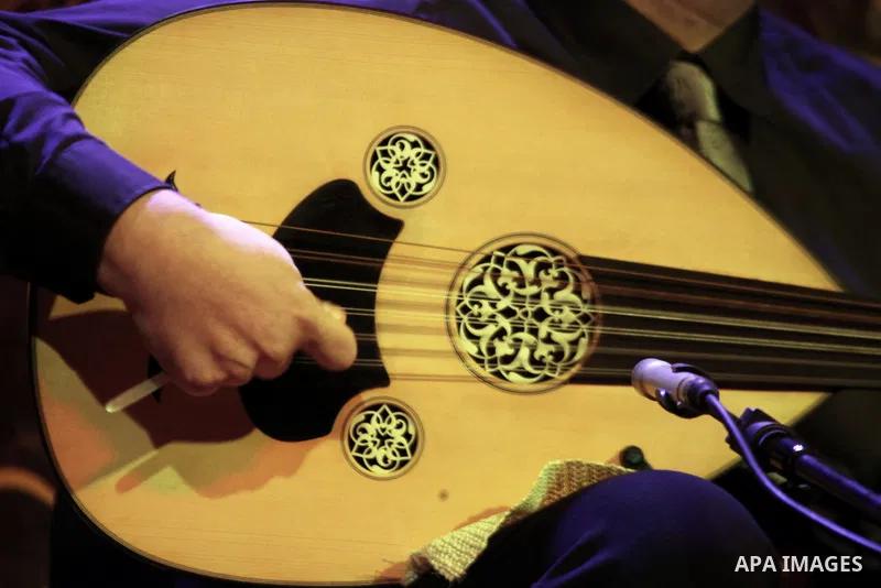 A member of "Ramses Qisses" musical band performs during the fifth concert of "Music nights in Jerusalem of Arab" festival, in Jerusalem on November 17, 2013. The festival organised by Edward Said music conservatory for...