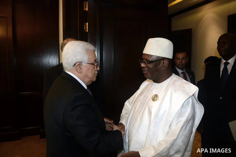 Palestinian President Mahmoud Abbas meets with the President of the Islamic Republic of Mali Ibrahim Boubacar Keïta during the Arab and African leaders summit in Kuwait City on November 19, 2013. The two-day summit that...