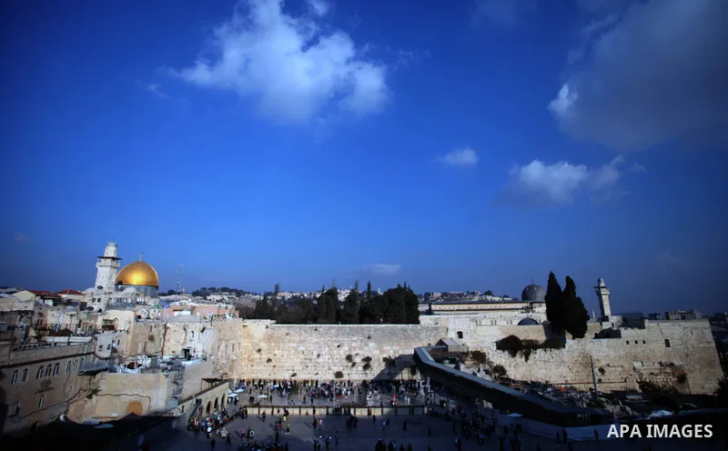 The Dome of the Rock mosque is seen as Israeli workers dig next to the Western wall in Jerusalem's Old City, November 20, 2013. Al-Aqsa foundation warned from the mass break-ins that called by a Jewish extremist associat...