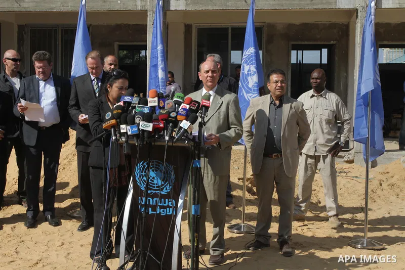 Coordinator of Humanitarian Affairs in the United Nations James Rowley speaks during a press conference at school in Jabalya in the northern Gaza Strip on Nov. 21, 2013. James Rowley announced the suspension of projects...