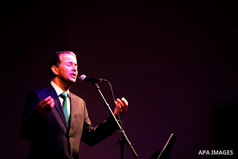 Jordanian singer Ayman Yahya sings during the concert of the week before last of "Music nights in Jerusalem of Arab" festival, in Jerusalem on November 21, 2013. The festival organised by Edward Said music conservatory f...