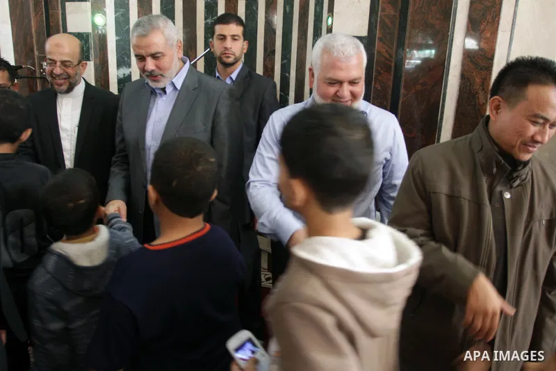 Palestinian Prime Minister in Gaza Strip, Ismail Haniyeh meets with the convoy of "Miles of Smiles 23" following the Friday prayers, in Gaza City on November 22, 2013. Photo by Mohammed Asad