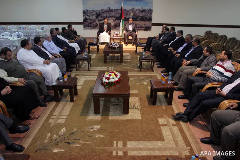 Palestinian Prime Minister in Gaza Strip, Ismail Haniyeh meets with the convoy of "Miles of Smiles 23" at his house in Gaza city November 22, 2013. Photo by Mohammed Asad