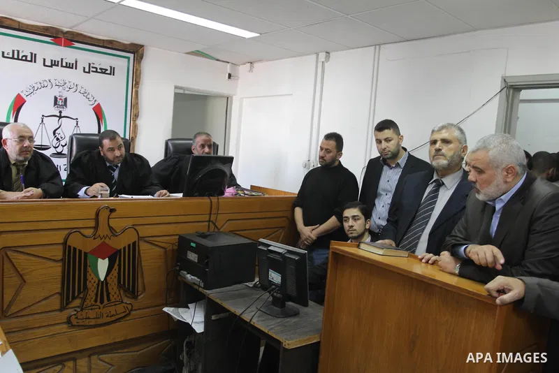 Palestinian Prime Minister in Gaza, Ismail Haniyeh, visits The Palestinian Islamic courts and judicial, in Gaza City November 25, 2013. Photo by Mohammed Asad