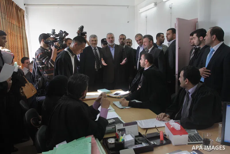 Palestinian Prime Minister in Gaza, Ismail Haniyeh, visits The Palestinian Islamic courts and judicial, in Gaza City November 25, 2013. Photo by Mohammed Asad