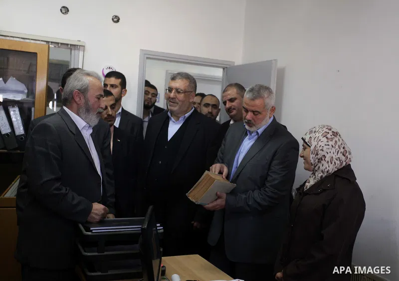 Palestinian Prime Minister in Gaza strip Ismail Haniyeh, visits the Fatwa and Legislation's office, in Gaza City on November 26, 2013. Photo by Ashraf Amra