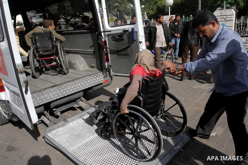 Palestinians disabled take part in a protest against the Israeli blockade on Gaza strip, in Gaza city on November 27, 2013. Israel imposed a blockade on Gaza in 2007 after Islamist group Hamas seized control of the terri...