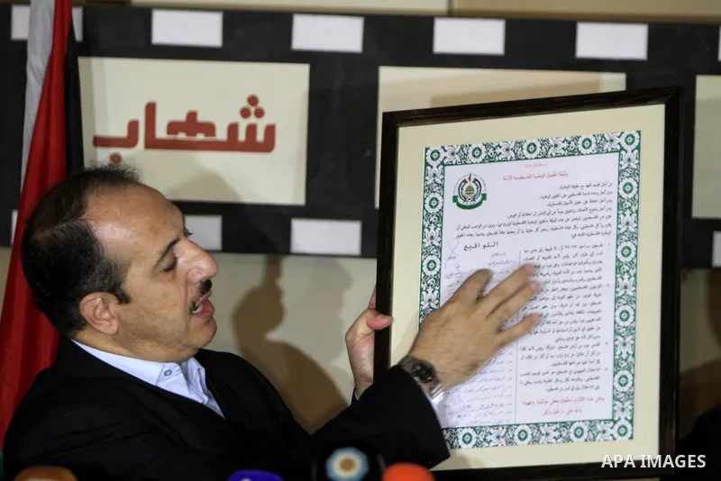 Head of of Refugee Affairs in Gaza strip, Essam Adwan speaks during a press conference about the 66th anniversary of the decision to partition Palestine No. 181 Issued by the General Assembly of the United Nations, in th...