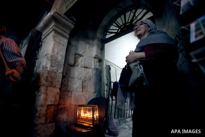 Ultra-Orthodox Jews light the fifth Hanukkah candle during the Jewish holiday of Hanukkah in Jerusalem's Mea Shearim neighbourhood, on Dec. 3, 2013. Hanukkah, also known as the Festival of Lights, is one of the most impo...