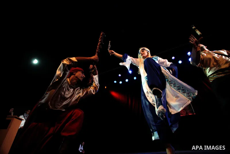 Palestinian youths participate in dancing of "Dabka" at Al-Hakawati Stage in the Old City of Jerusalem on Dec. 07, 2013. Photo by Saeed Qaq