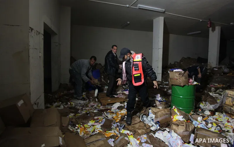 Palestinians try to save medicines at a drugstore after being flooded during four days of storms in Beit Hanoun, in the northern Gaza Strip, December 16, 2013. The results of winter storm Alexa in Gaza will lead to a hea...
