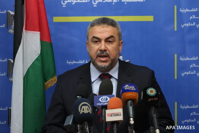 Palestinian Minister of Awqaf and Religious Affairs, Ismail Radwan, speaks during in a press conference about the devastating losses during four days of severe weather conditions in the coastal territory, in Gaza city, D...
