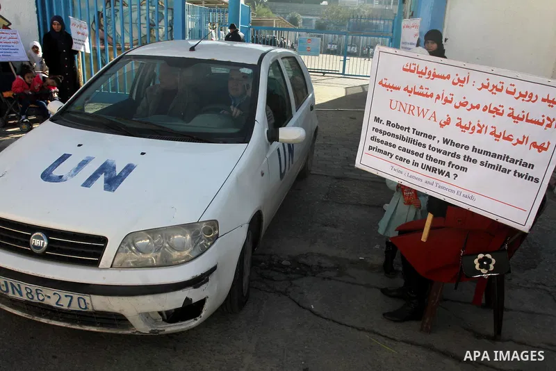 Palestinian family of twins suffering from metabolic disorder, take part in a protest in front of the headquarters of the United Nations (UNRWA) against the medical negligence for lack of early detection of their disease...