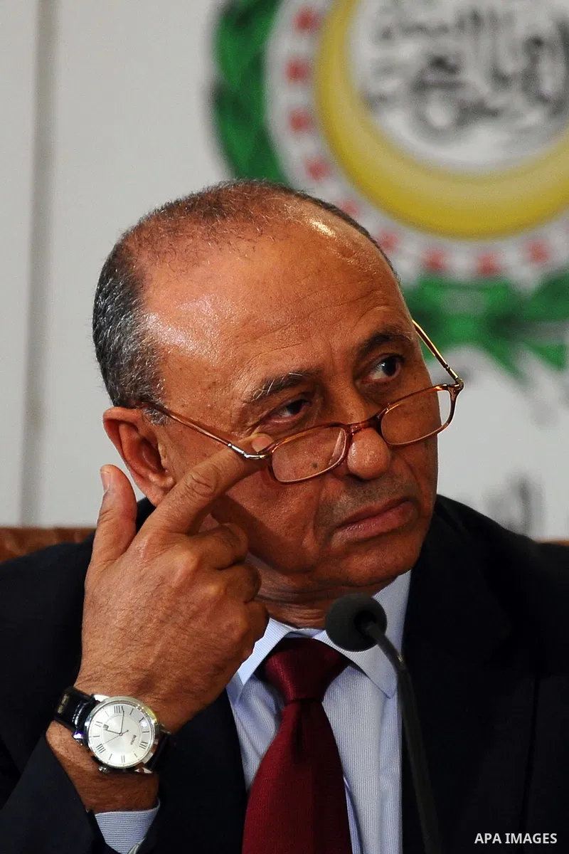 Arab League Secretary-General Nabil al-Araby and Libyan Foreign Minister Mohamed Abd El Aziz attend the press conference following Arab League Foreign Ministers emergency meeting held at the Arab League headquarters in C...