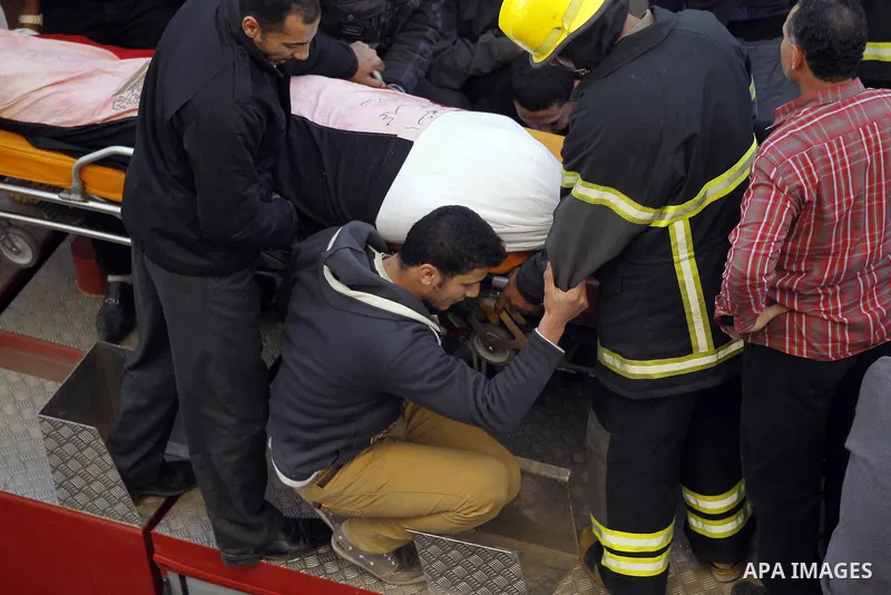 Egyptian mourners participate in the funeral of victims killed in an explosion outside the police headquarters, in Mansoura, Dakahlia, Egypt, 24 December 2013. Egyptian Health and Interior Ministry said on 24 December a...