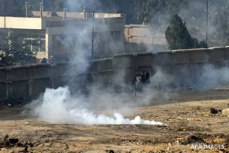 Egyption students of Al-Azhar University, who are supporters of the Muslim Brotherhood and deposed President Mohamed Mursi, clash with riot police and residents of the area at the Al-Azhar University campus in Cairo's Na...
