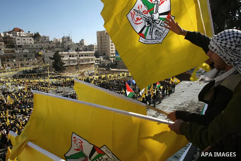 Palestinian Fatah supporters take part in a rally marking the 49th anniversary of the Fatah movement, in the West Bank city of Hebron January 2, 2014. Photo by Mamoun Wazwaz