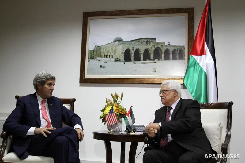 Palestinian President Mahmoud Abbas (L) meets with US Secretary of State John Kerry, in the West Bank City of Ramallah, January 03, 2013. Kerry began his 10th trip to the area on 02 January and met Israeli Prime Minister...