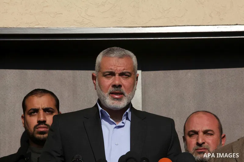 Palestinian Prime Minister in Gaza Strip Ismail Haniyeh, speaks during a press conference in Gaza City on January 06, 2014. Haniyeh said Monday that his Hamas-led government will allow the return of Fatah members who lef...
