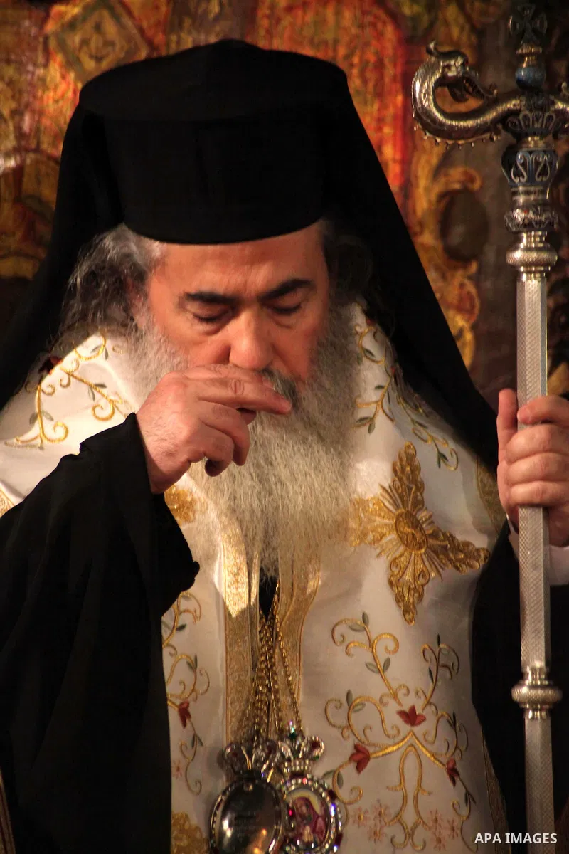 Greek Orthodox Patriarch of Jerusalem Theophilos III leads the service at the Church of the Nativity in the biblical West Bank town of Bethlehem as Orthodox Christmas celebrations kicked off on January 6, 2014, in the tr...