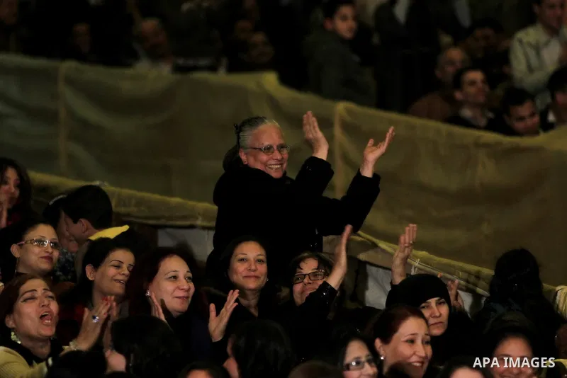 Worshippers pray during Christmas Eve Mass at Cairo s St. Mark s Cathedral, seat of the Coptic Orthodox Pope, in Cairo, Egypt, late Monday Jan. 6, 2014. Millions of Egyptian Christians on Monday thronged to churches acro...