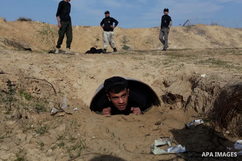 Palestinian high school students take part in a military-styled exercise routine at a course conducted by the Hamas-run ministry of education, in Rafah in the southern Gaza Strip January 9, 2014. Male students would lear...