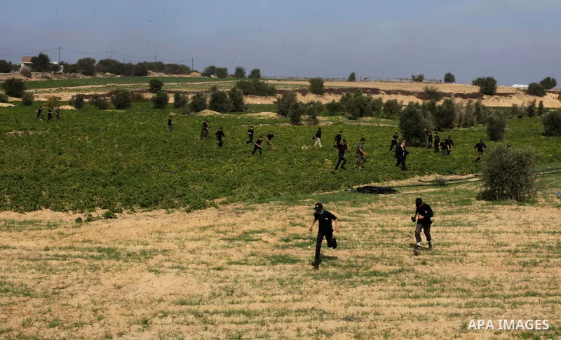 Palestinian high school students take part in a military-styled exercise routine at a course conducted by the Hamas-run ministry of education, in Rafah in the southern Gaza Strip January 9, 2014. Male students would lear...