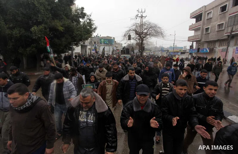 Palestinian supporters of the Islamic Jihad chant slogans against resuming peace talks with Israel as they demonstrate in Gaza City, Jan. 10, 2014. In recent weeks, U.S. Secretary of State John Kerry has stepped up invol...
