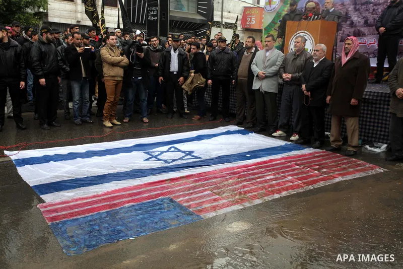 Palestinian supporters of the Islamic Jihad take part in a demonstration against resuming peace talks with Israel in Gaza City, Jan. 10, 2014. In recent weeks, U.S. Secretary of State John Kerry has stepped up involvemen...
