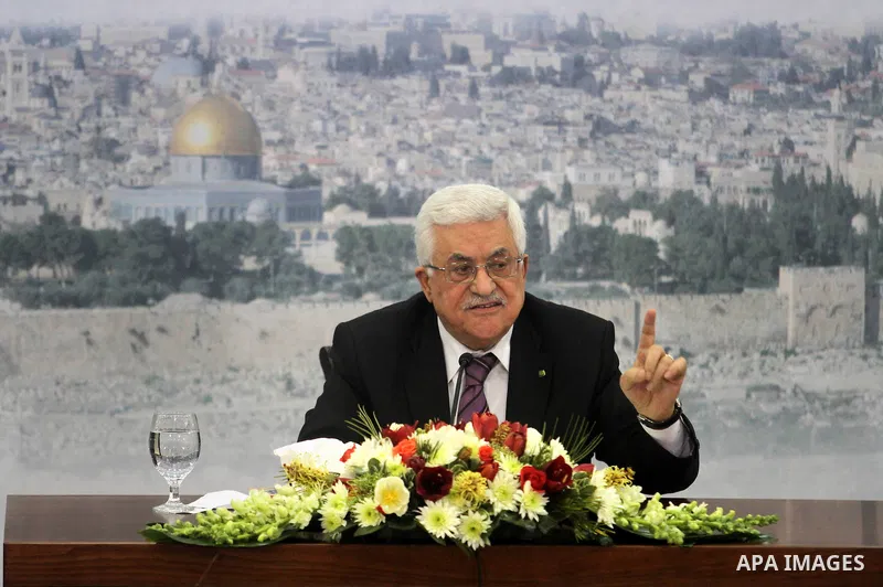 Palestinian President Mahmud Abbas delivers a speech in front of hundreds of Palestinians in the West bank city of Ramallah, on January 11, 2014. Israel unveiled plans on January 12, for more than 1,800 new settler homes...