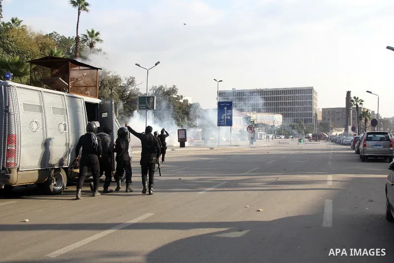Students of Cairo University, who are supporters of the Muslim Brotherhood and deposed Egyptian President Mohamed Mursi, clash with riot police in Cairo on January 12, 2014. Reports state that three years after the Arab...