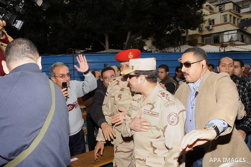Egyptian Minister of Defense Abdel Fattah el-Sisi inspects a polling station during the referendum on the draft constitution, Cairo, Egypt, 14 January 2014. Egyptians began on 14 January to vote on a new constitution dra...