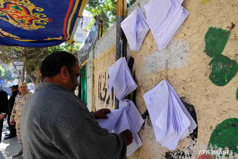 Egyptians cast their votes during the second day of voting on a new constitution on January 15, 2014 in Cairo. Egyptians resumed voting in the constitutional referendum, with turnout expected to hold the key to a likely...