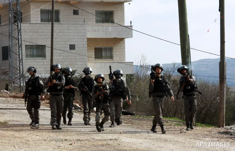 Palestinian protestors clash with Israeli soldiers near the Jewish settlement of Qadomem, near Nablus, West Bank,17 January 2014. Fifteen Palestinians were reportedly wounded during the clashes accompanying the weekly Fr...