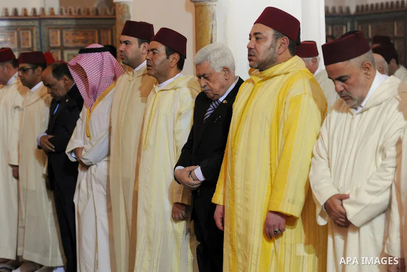 Palestinian President, Mahmoud Abbas (Abu Mazen) meets with the King Mohammed VI, King of Morocco in Marrakechm on Jan. 17, 2014. Photo by Thaer Ganaim