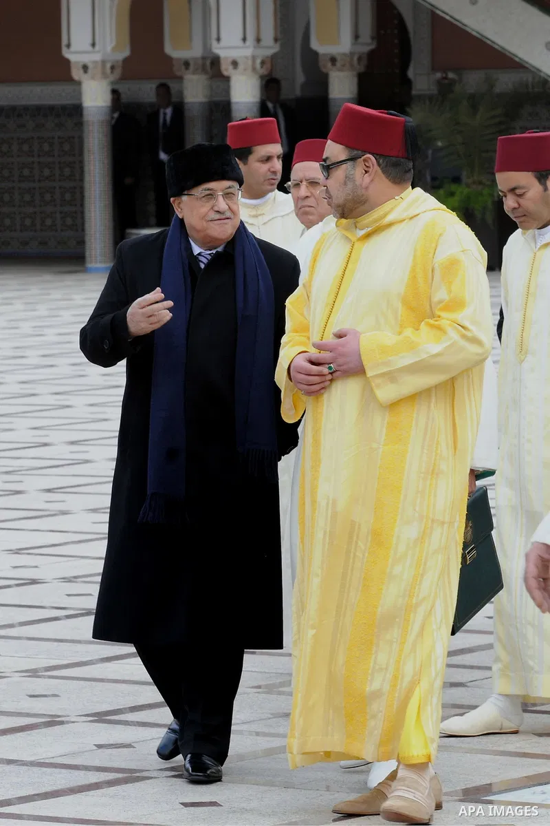 Palestinian President, Mahmoud Abbas (Abu Mazen) meets with the King Mohammed VI, King of Morocco in Marrakechm on Jan. 17, 2014. Photo by Thaer Ganaim