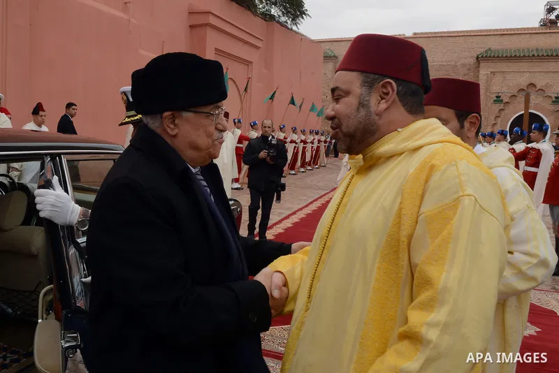Palestinian President, Mahmoud Abbas (Abu Mazen) meets with the King Mohammed VI, King of Morocco in Marrakechm on Jan. 17, 2014. Photo by Thaer Ganaim
