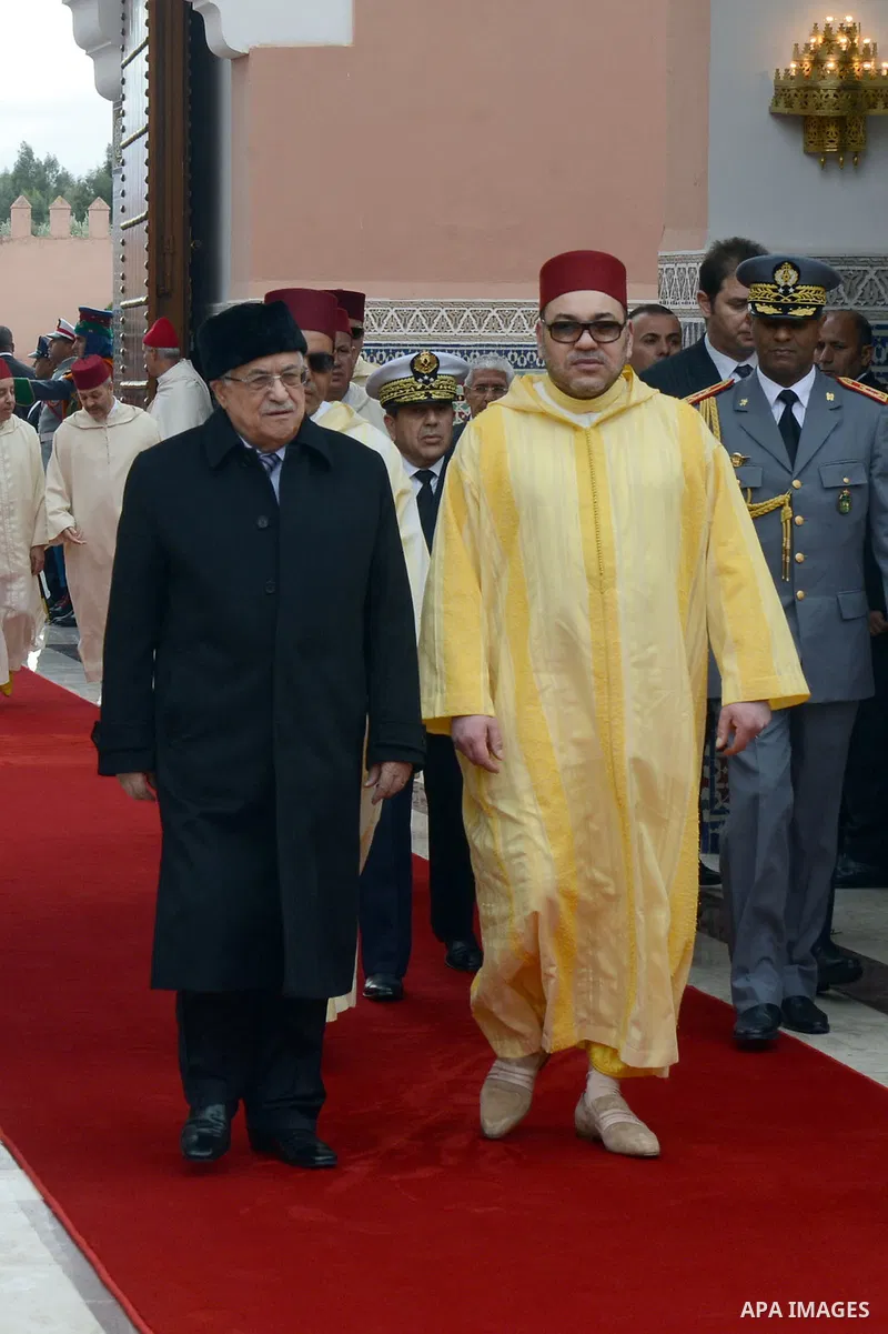 Palestinian President, Mahmoud Abbas (Abu Mazen) meets with the King Mohammed VI, King of Morocco in Marrakechm on Jan. 17, 2014. Photo by Thaer Ganaim