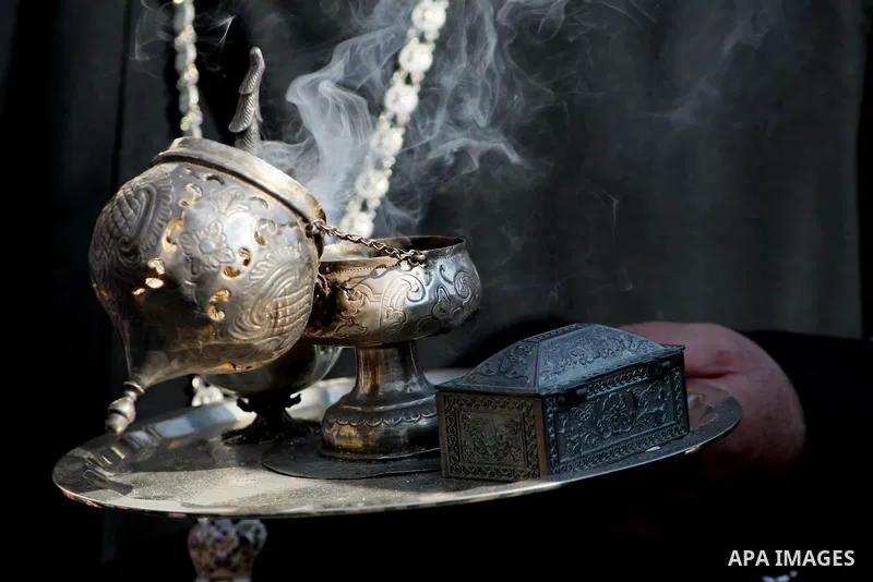 Armenian Orthodox clergy attend Christmas celebrations outside the Nativity Church in the biblical West Bank city of Bethlehem on January 18, 2014. While most Armenians celebrate Christmas on January 6th, the Orthodox Ar...
