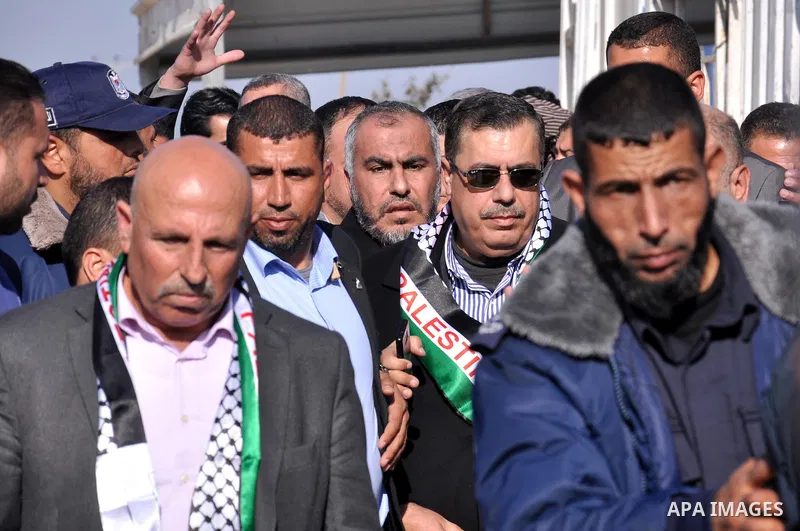 Palestinian Fatah members arrive at the Erez crossing between Israel and the northern Gaza Strip on January 21, 2014. Palestinian Prime Minister in Gaza Strip Ismail Haniyeh announced on 06 January that his Hamas-led gov...